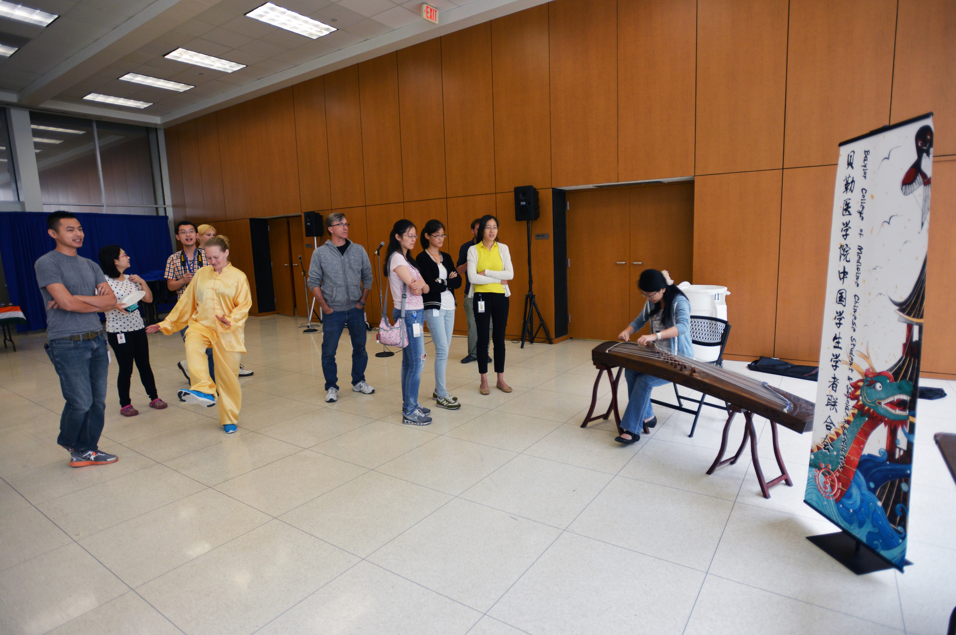 Students playing music for attendees.