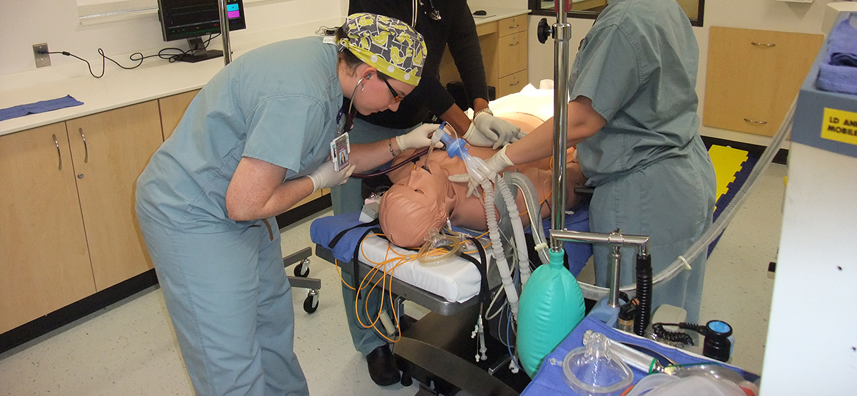 Anesthesia residents running a scenario in the simulation lab
