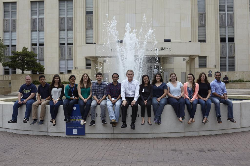 Members of the Cooper Lab in front of the Alkek Fountain at Baylor College of Medicine.