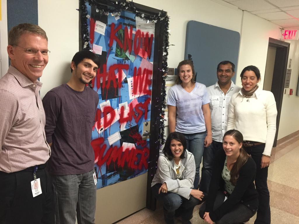 Winners of the Halloween door contest and pizza for the lab