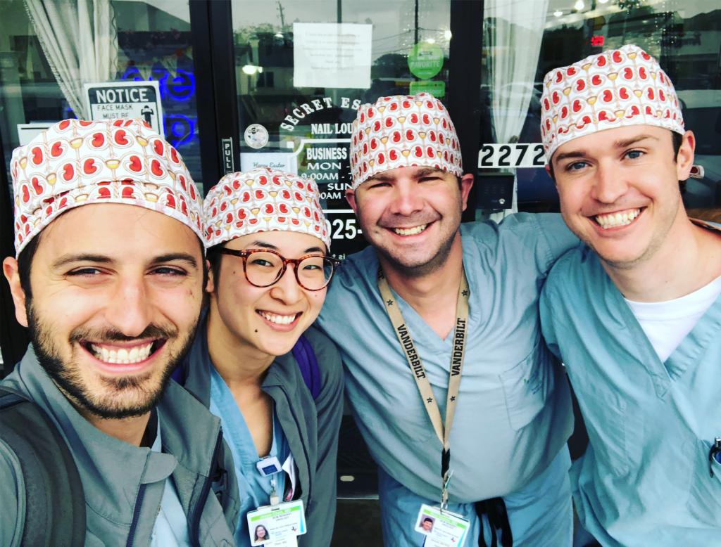 Resident team sports their new matching hand-made scrub caps.