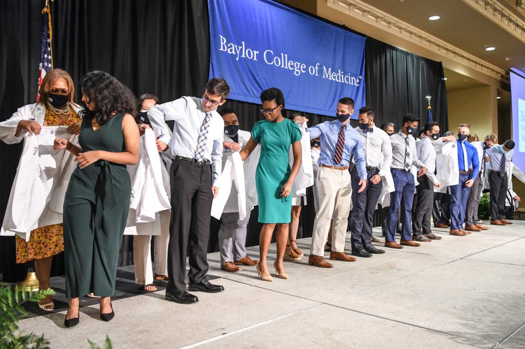 First-year medical students receive a traditional white coat at the annual White Coat Ceremony.