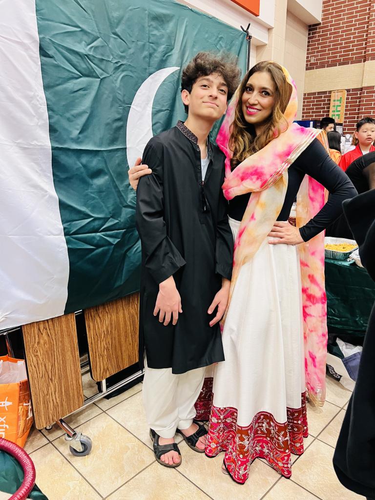 Dr. Pirzada and son representing Pakistan at school International Festival Night.