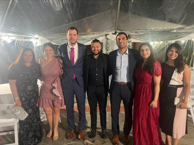 group of people dressed nicely, smiling