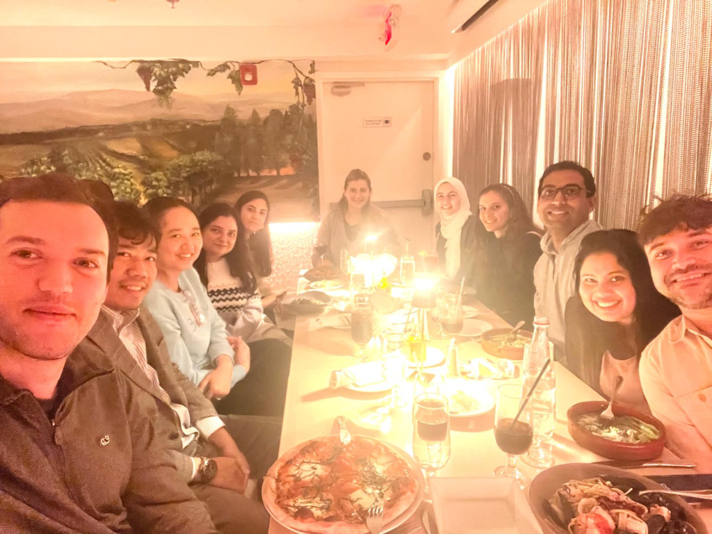 people at a dinner, smiling