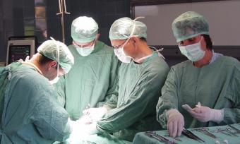 Doctors performing a surgery.