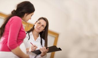 Doctor screening pregnant woman