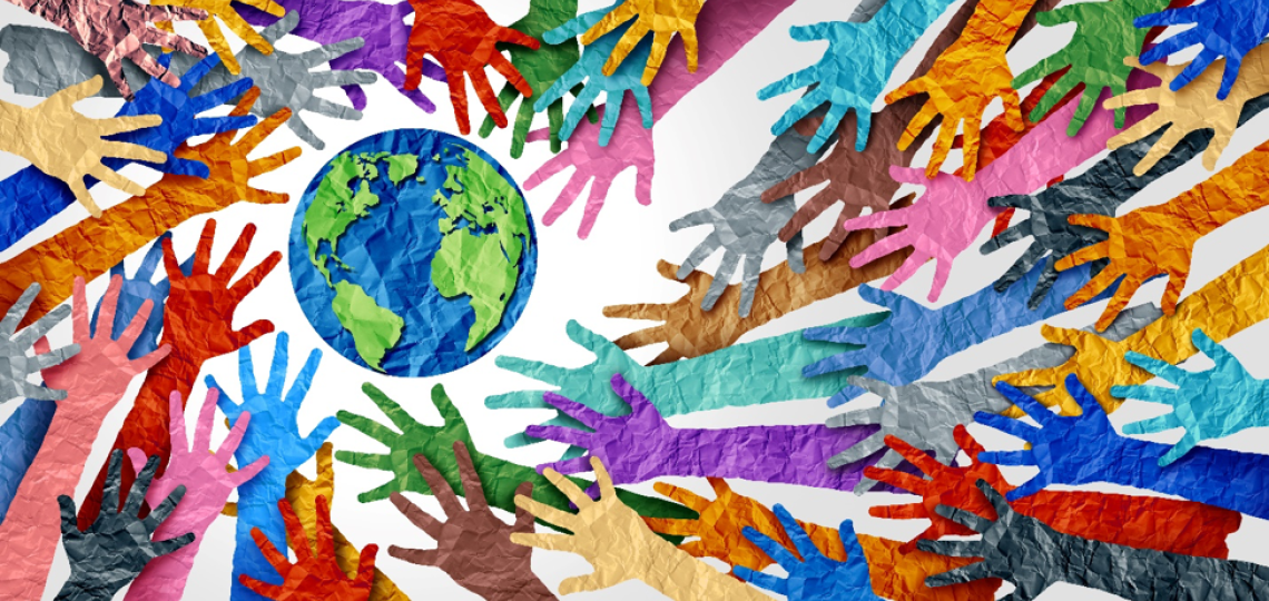 Diversity Illustration of hands of many colors reaching toward a globe of the earth.