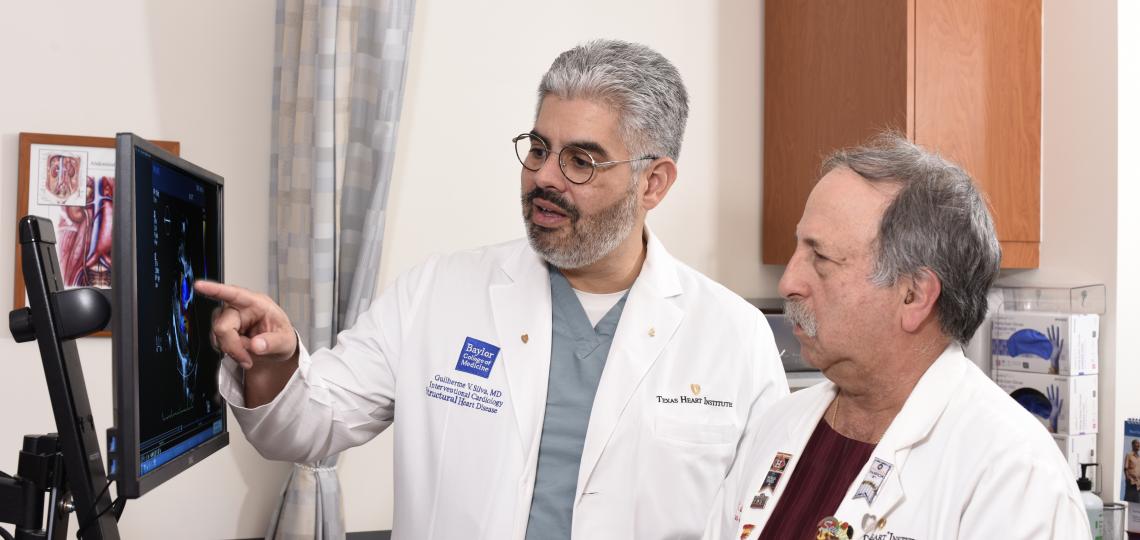 Dr. Guilherme Silva (left) and Dr. Neil Strickman (right) providing services in the Cardiology Clinic