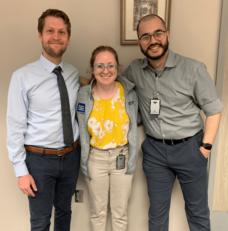 The three chief medical residents stand together