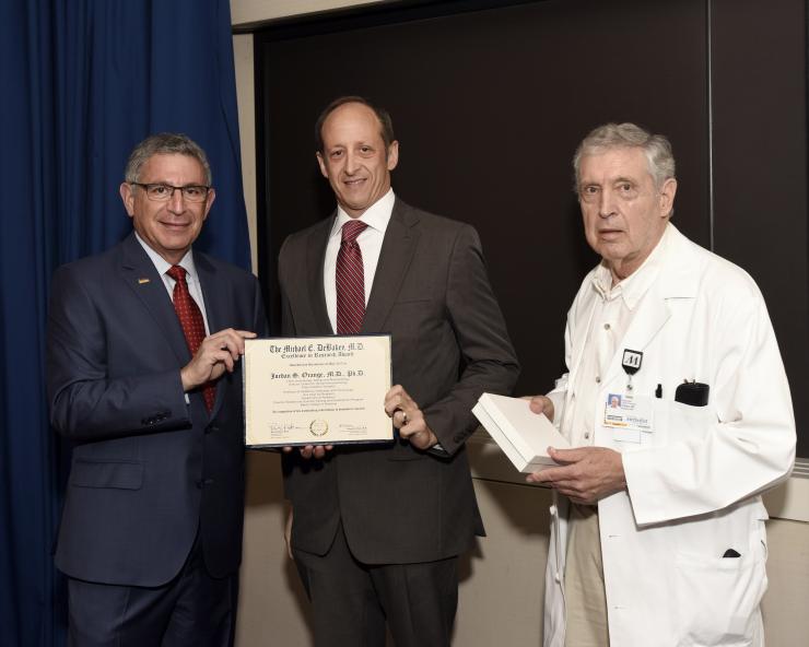 Dr. Jordan S. Orange with Drs. Paul Klotman and George Noon