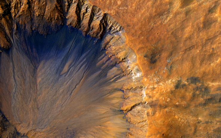 Impact crater in the Sirenum Fossae region of Mars on March 30, 2015.