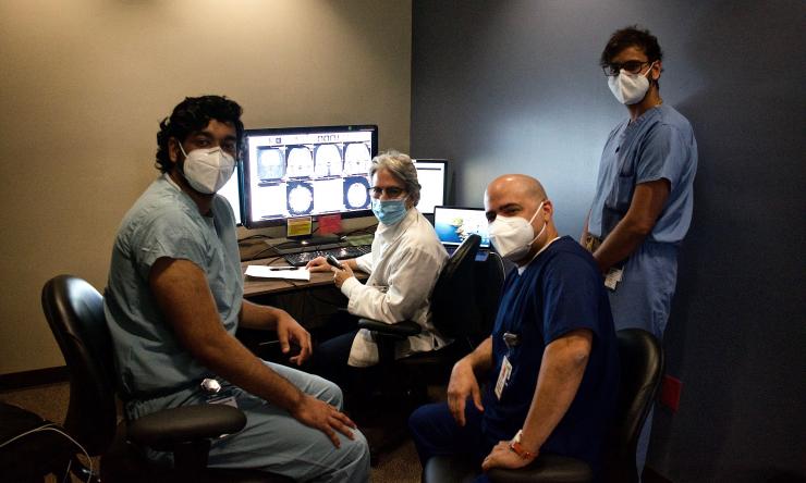Residents and Faculty collaborating on a neuroradiology case at Ben Taub. Residents and Faculty collaborating on a neuroradiology case at Ben Taub.