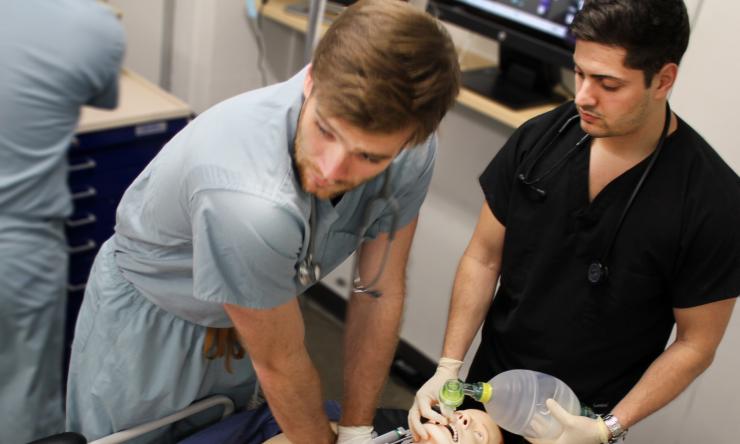 Members of Baylor’s Simlympic Team resuscitate Sim Man in the college’s Simulation Center
