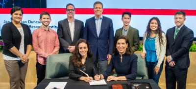 Seated: co-founder of LouLou Foundation Lynn Jafar; Dr. Huda Zoghbi. Standing: Surabi Veeraragavan, Ph.D.; Derek Reznik; LouLou Foundation chief scientific officer Daniel Lavery, Ph.D; LouLou Foundation co-founder Majid Jafar; Rodney Samaco, Ph.D.; Miranda Torres; Christopher McGraw, MD, Ph.D.