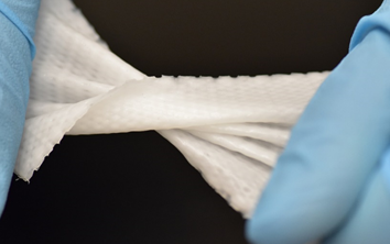 3D printed Biomesh demonstrating its mechanical strength and flexibility