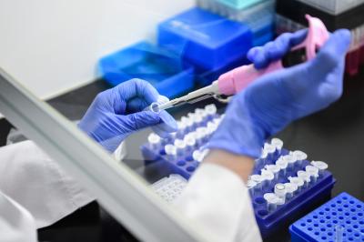 Lab technician preparing testing samples.