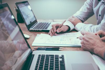 Close up of hands working in an office