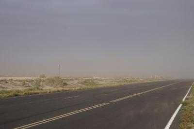 Empty road covered by haze