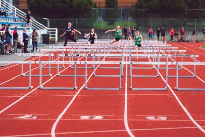 Girls running on their track team