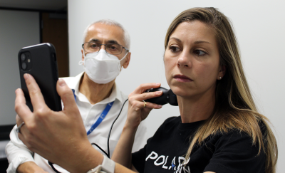 Spaceflight participant Anna Menon tests a portable ultrasound device as part of the TRISH-sponsored research complement for Polaris Dawn.