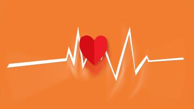 Red heart on orange background with white heart beat graph lines. 