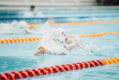 Photo of a person swimming in a race