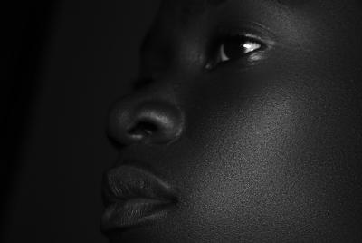 Close up photo of a woman's face to show skin details