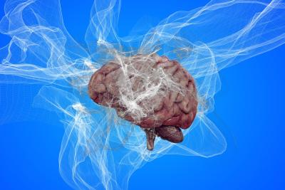 Image of a brain surrounded by a cloud of smoke to give the illusion of brain fog or abnormal brain function.