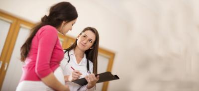 Doctor screening pregnant woman