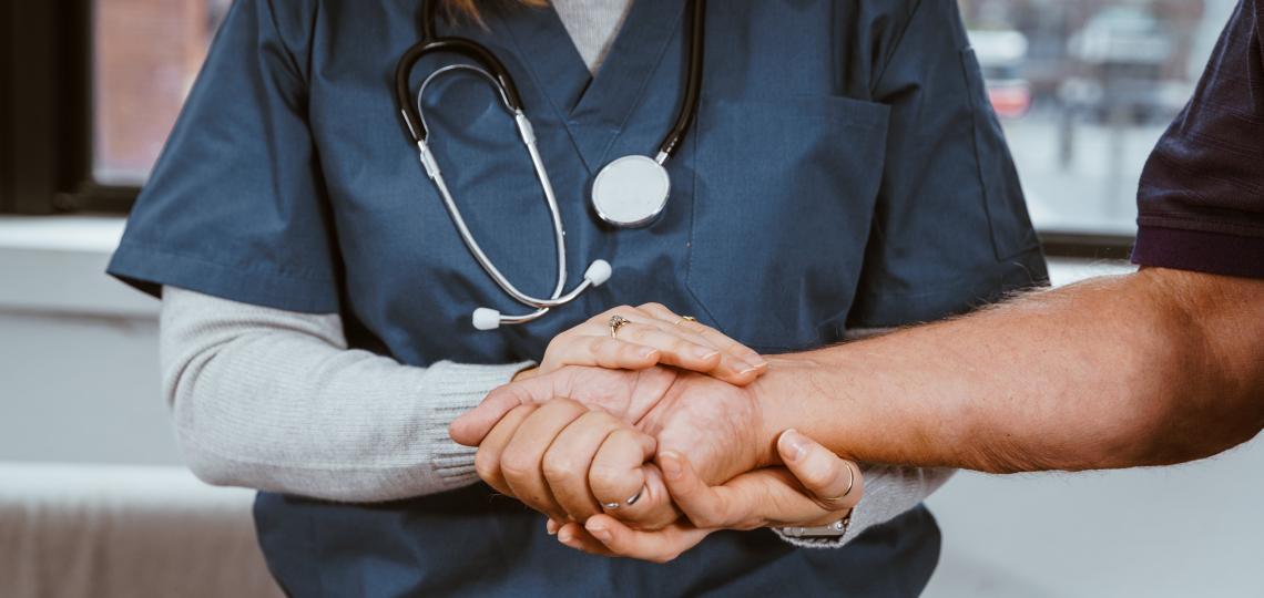 Nurse helping patient