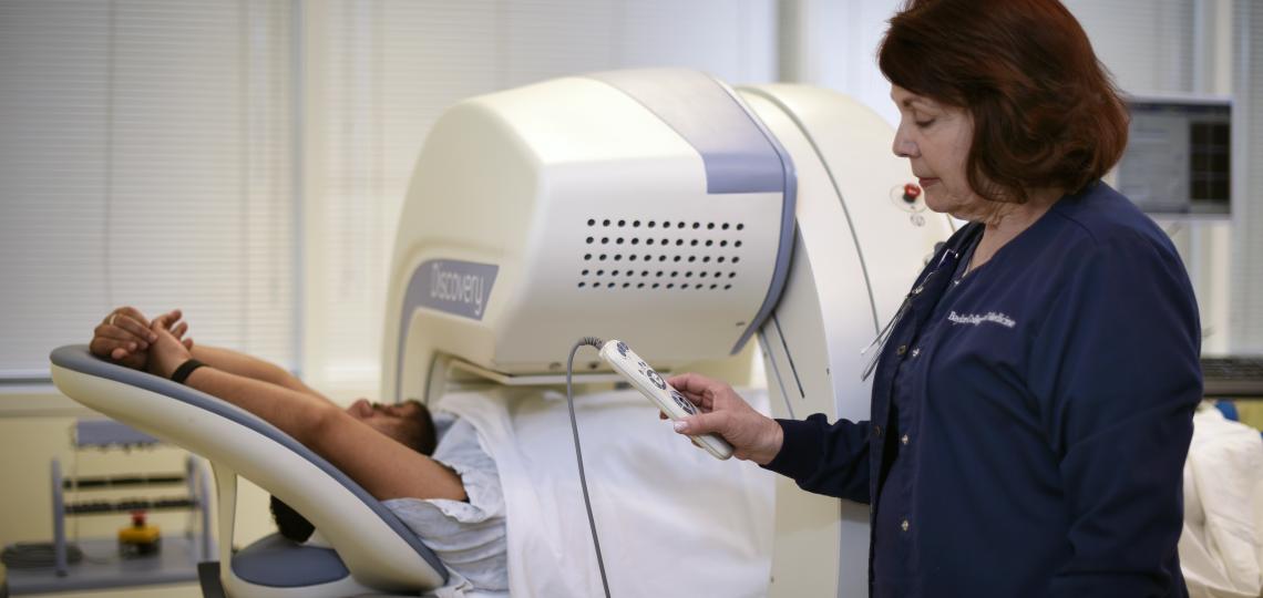 A doctor monitoring a patient undergoing a electrophysiology study. 