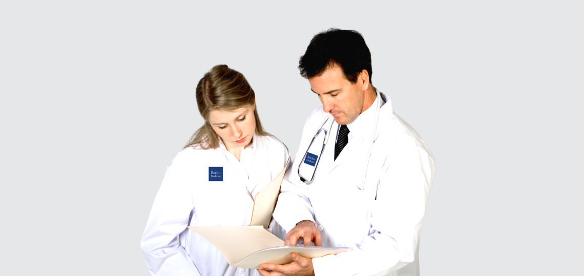 Medical doctors studying a patients chart