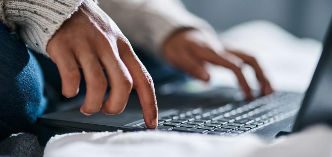 Person working on a laptop