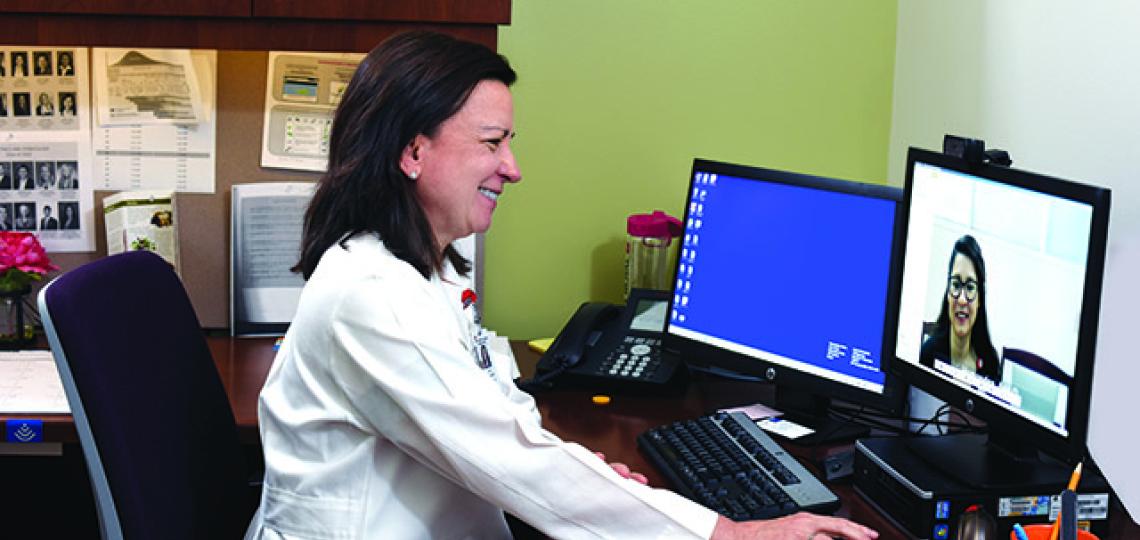A Baylor reproductive psychiatry patient meets with her doctor via telemedicine about her mental health.