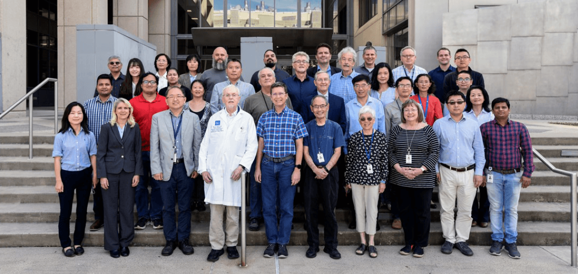 Members of the Center for Coregulator Research (CCR) pose together on stairs