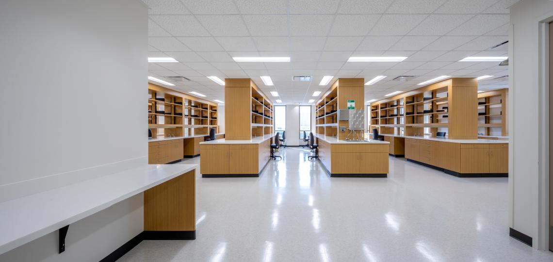 A spacious, clean lab with white walls and wood trappings