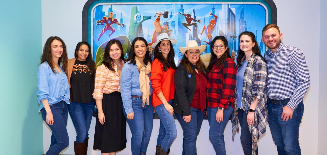 group of people smiling in rodeo wear