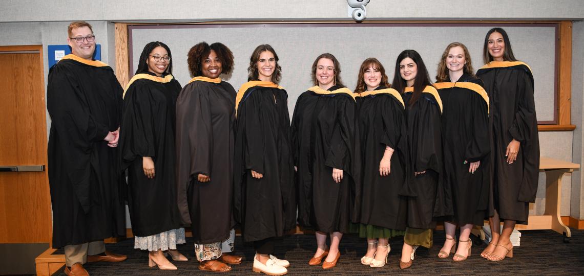 Graduates in Genetic Counseling Program take group photo. 