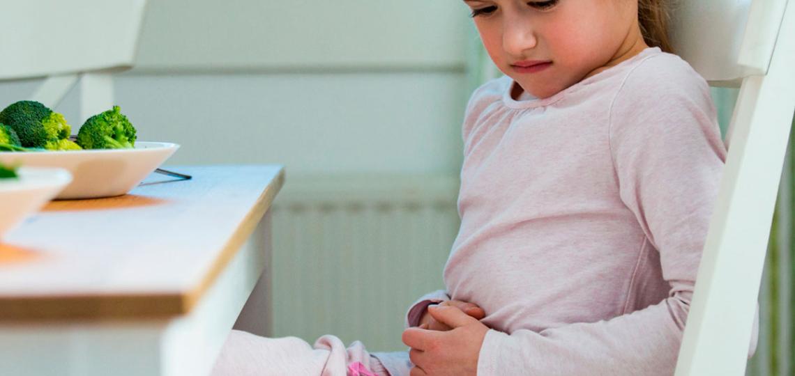 Young girl with stomach pain