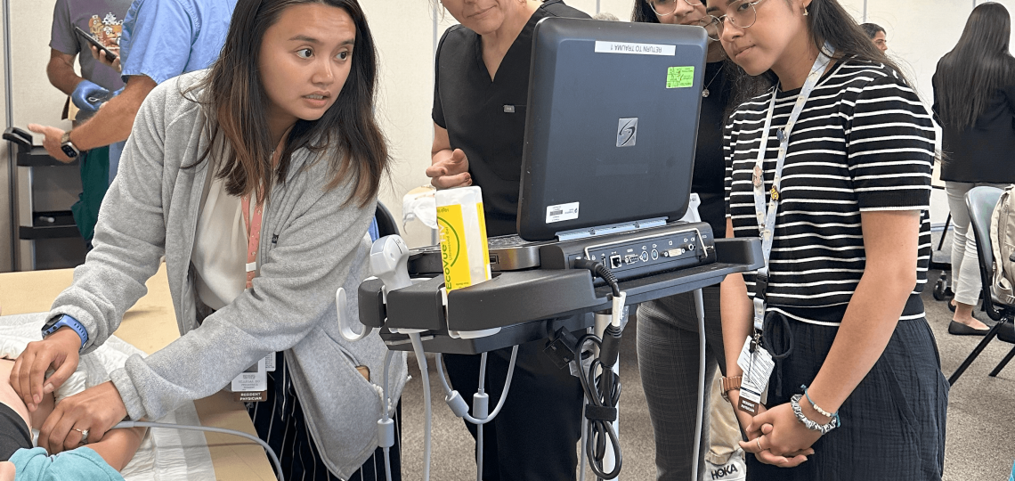 Interns participate in a simulation lab with ER attendings