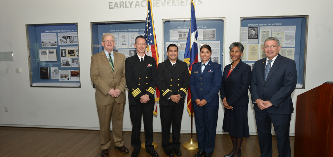 Dr. Eric Schoomaker, Dr. Timothy Porea, Bryant Nieto, Amanda Delgado, Provost Dr. Alicia Monroe and President Dr. Paul Klotman pose for a photo following the commissioning.