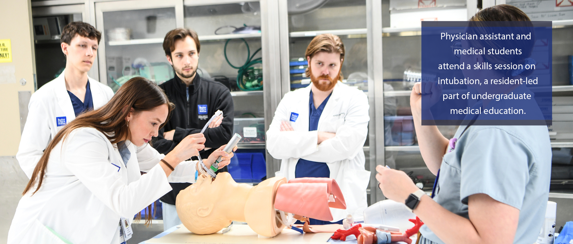 Physician assistant and medical students attend a skills session on intubation, a resident-led part of undergraduate medical education.