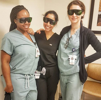 Dermatology residents in scrubs
