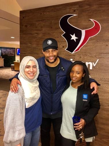 Dermatology residents with a player from the Texans