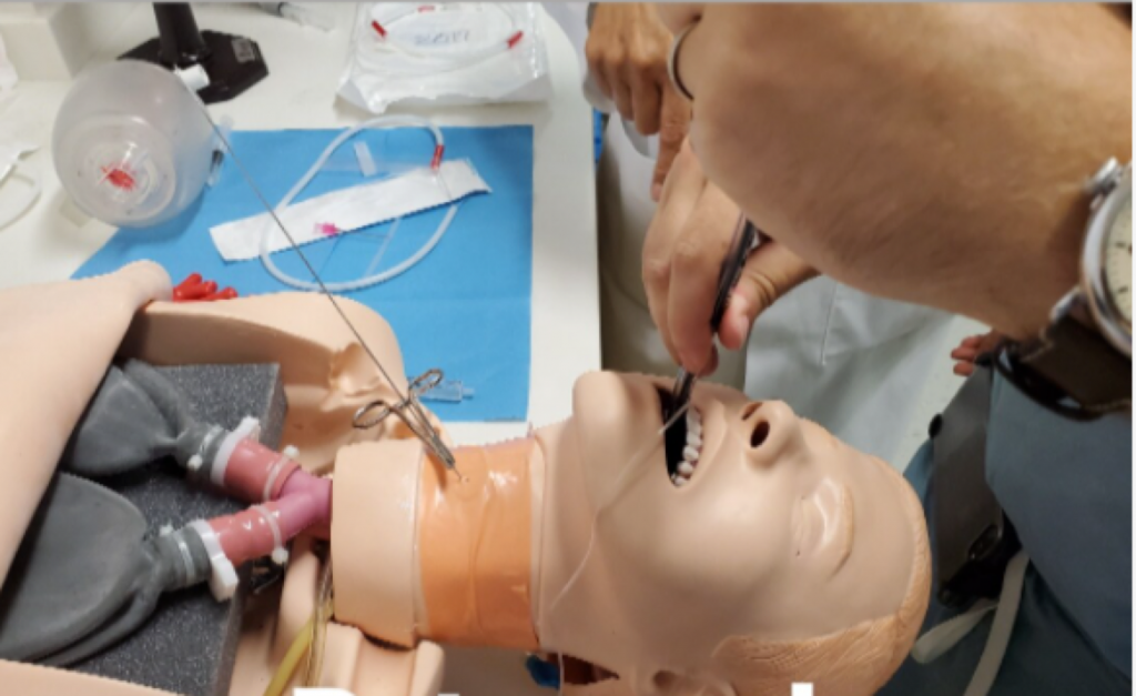 Practicing retrograde intubations in the sim lab.