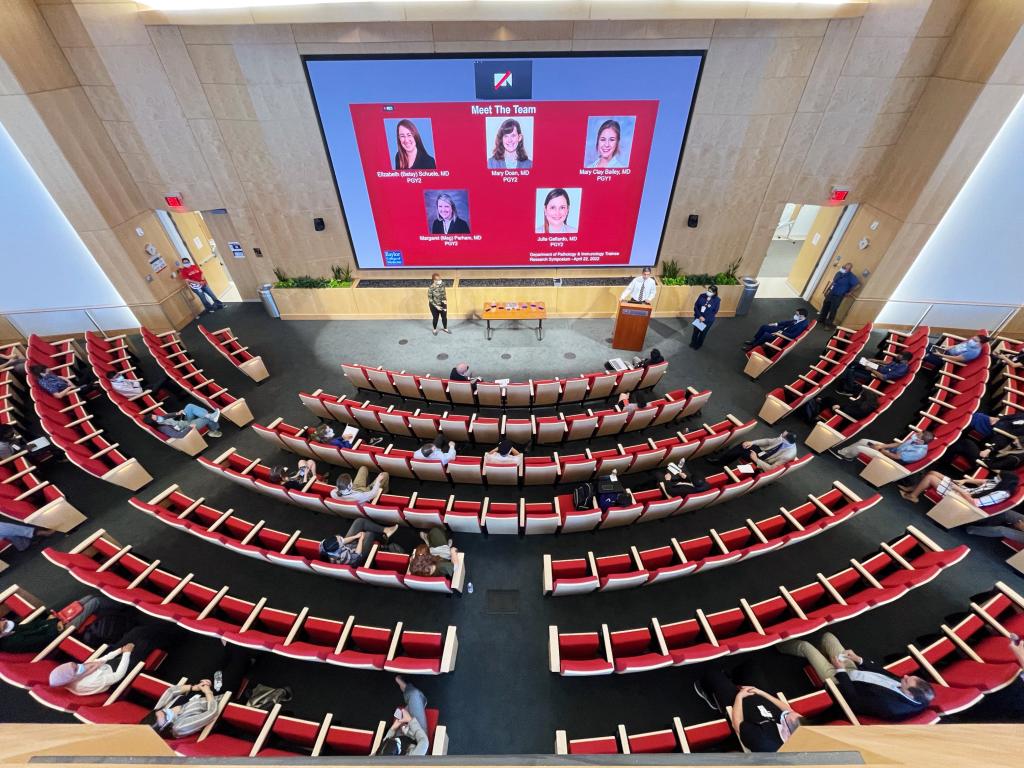 A view from above of the auditorium at the 2022 Annual Pathology and Immunology Trainee Research Symposium.