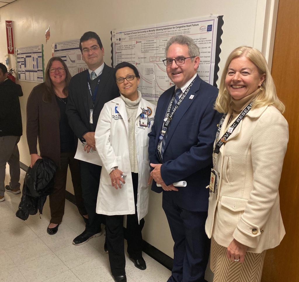 Drs. Dickinson, Henson, Razjouyan, Rumbaut, and Petersen (left to right) attending CTRID's 2019 poster session.