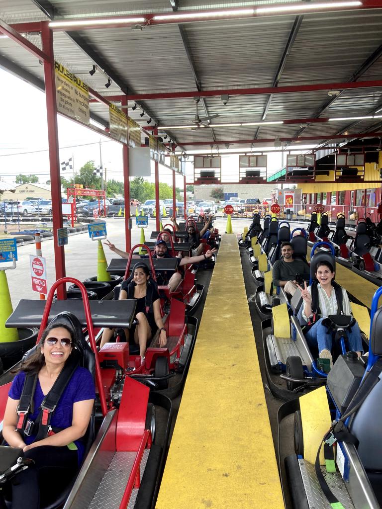 Residents seated in go karts