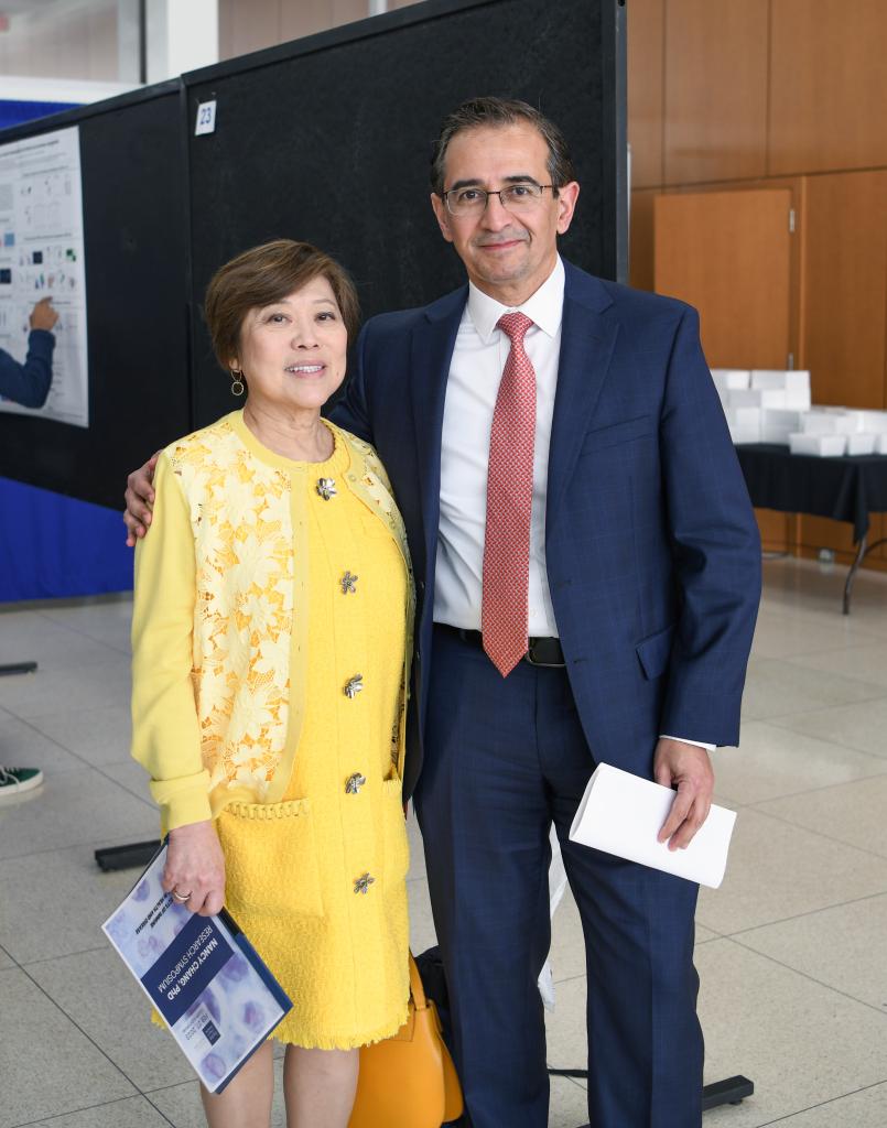 Dr. Nancy Chang (left) and Dr. Hashem El-Serag (right) during the Nancy Chang, Ph.D. Poster Session 2023